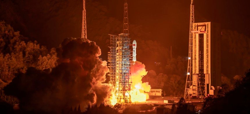 A Long March 3B carrier rocket carrying an experimental satellite blasts off from the Xichang Satellite Launch Center on December 30, 2021 in Xichang, China. Liu Guoxing / VCG via Getty Images